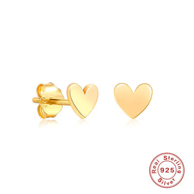 The Perfect Pairing: S925 Sterling Silver Heart Earrings and Black Bags