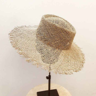 From London to the Shore: How British Flat Straw Hats Are Taking Over Summer Beaches