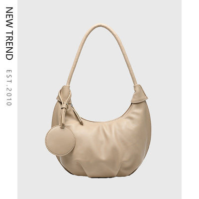 The Perfect Blend of Fashion and Function: Why Everyone Wants This Portable Underarm Bag