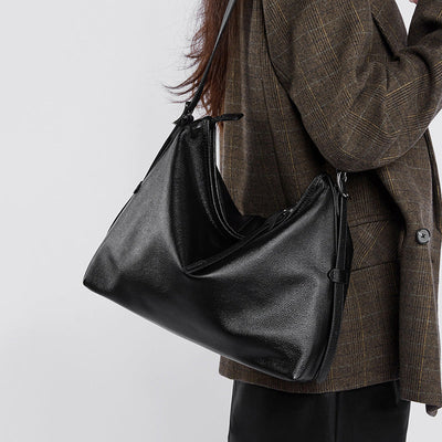 How to Style Black Bags for Every Season