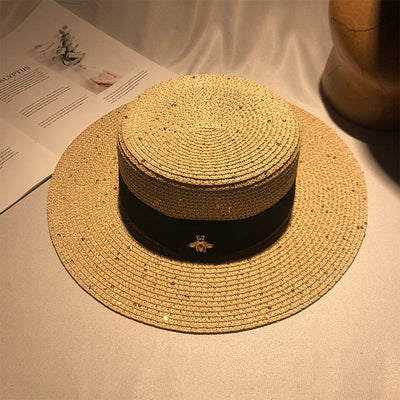 This Season’s Must-Have Beach Accessory: The Perfect Women’s Straw Hat